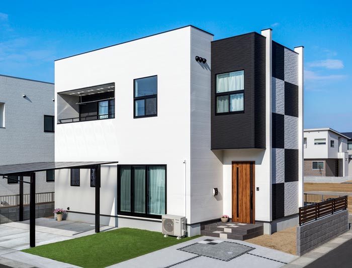 チェック模様をとり入れた一戸建て