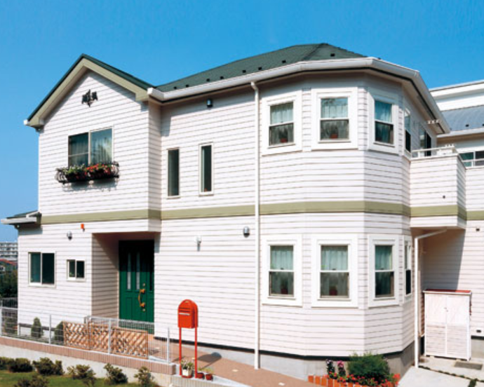 ホワイトとグリーンの外壁